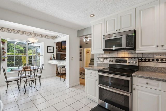 1129 CLIMBING ROSE DRIVE, Orlando, FL 32818