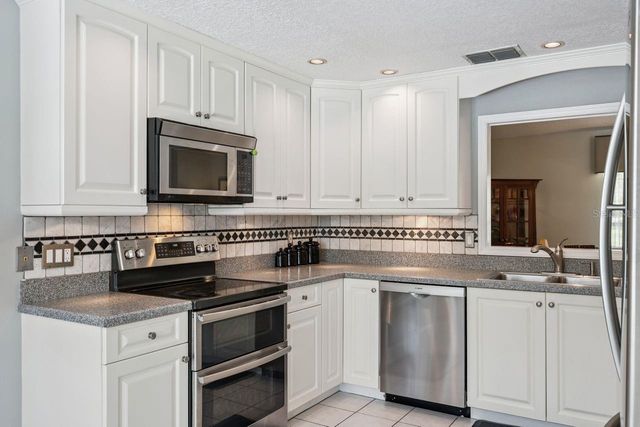 1129 CLIMBING ROSE DRIVE, Orlando, FL 32818