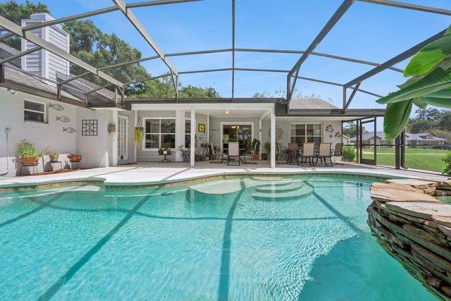 1129 CLIMBING ROSE DRIVE, Orlando, FL 32818