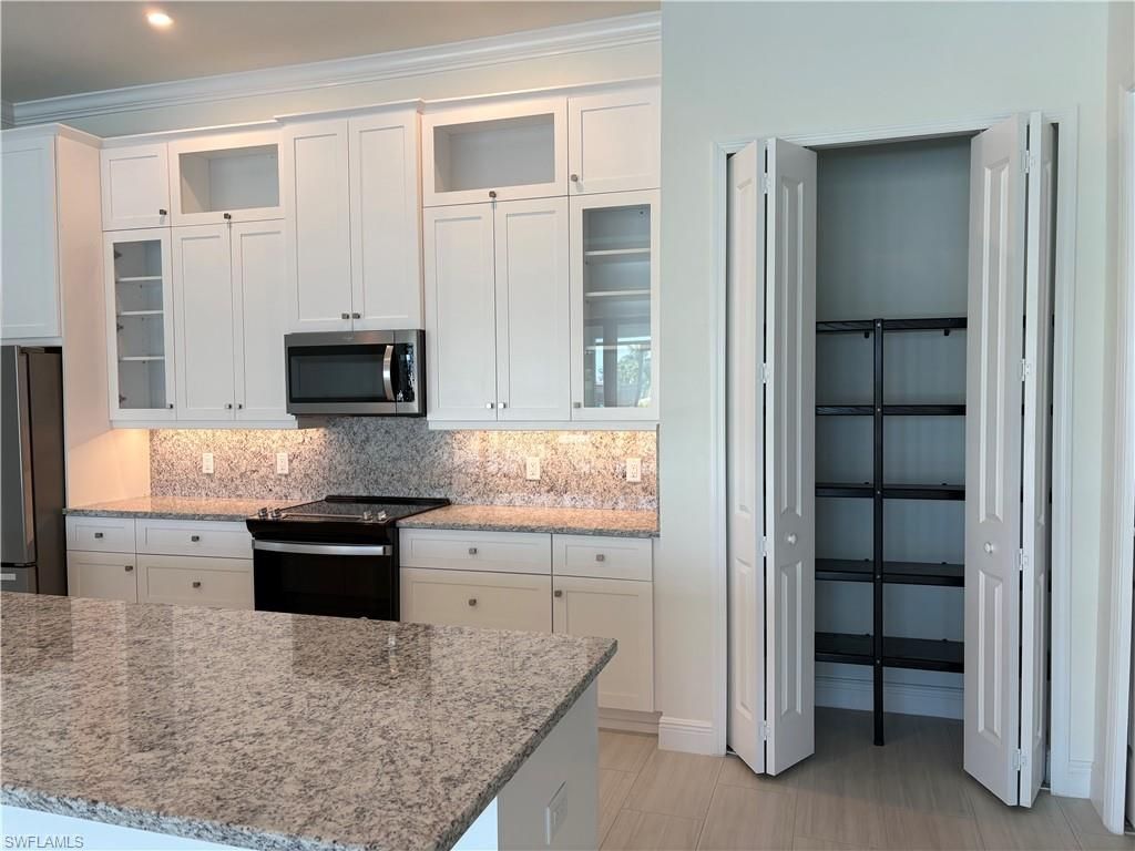Image 9 of property listing at 136 NW 29th PL, Cape Coral, FL 33993