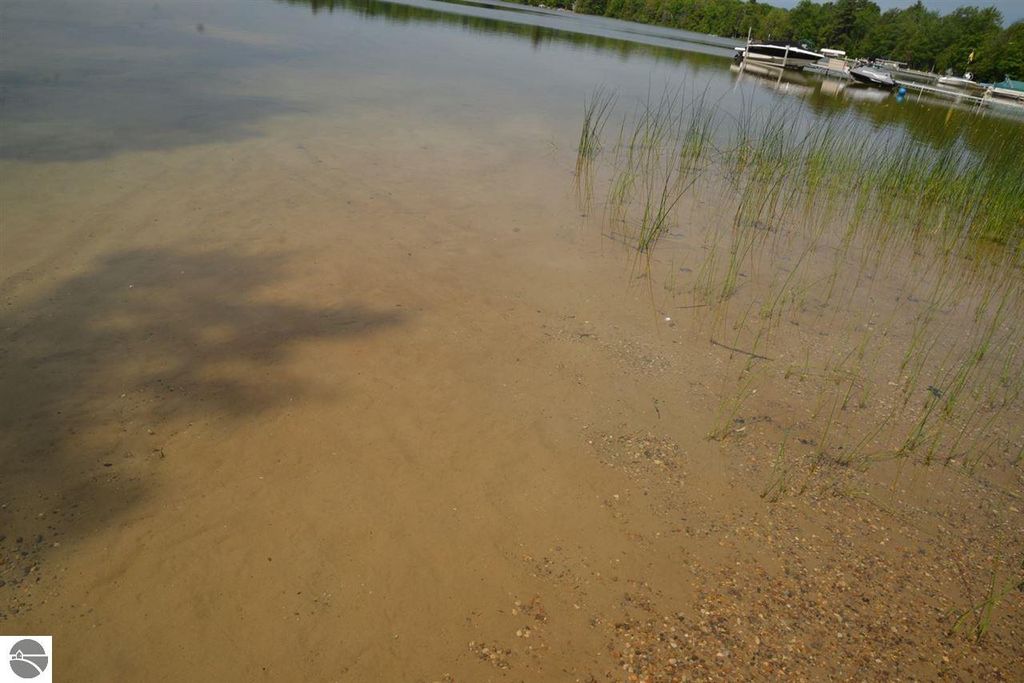 Image 2 of property listing at 000 Birch Pointe Drive, Kewadin, MI 49648