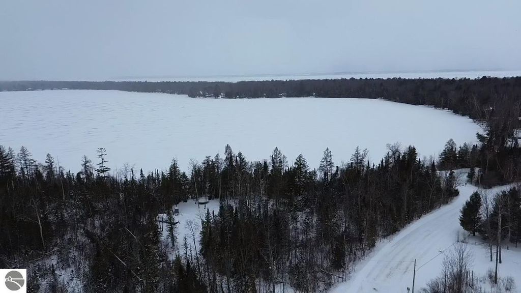 Image 6 of property listing at 000 Birch Pointe Drive, Kewadin, MI 49648