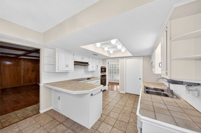12708 Whispering Hills Drive, Dallas, TX 75243