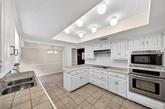 12708 Whispering Hills Drive, Dallas, TX 75243