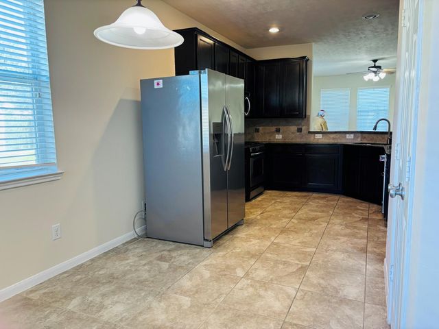 8525 Sunset Loch Drive, Spring, TX 77379