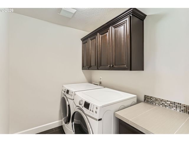 5802 Nw BANNISTER Dr, Portland, OR 97229