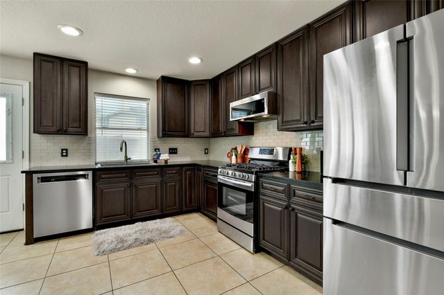 9310 Windy Spring Lane, Houston, TX 77089