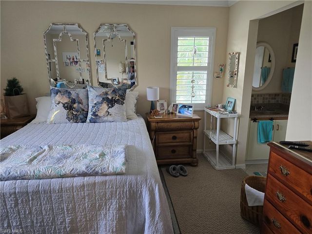 5741 Whitaker RD D-203, Naples, FL 34112