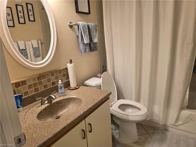 5741 Whitaker RD D-203, Naples, FL 34112