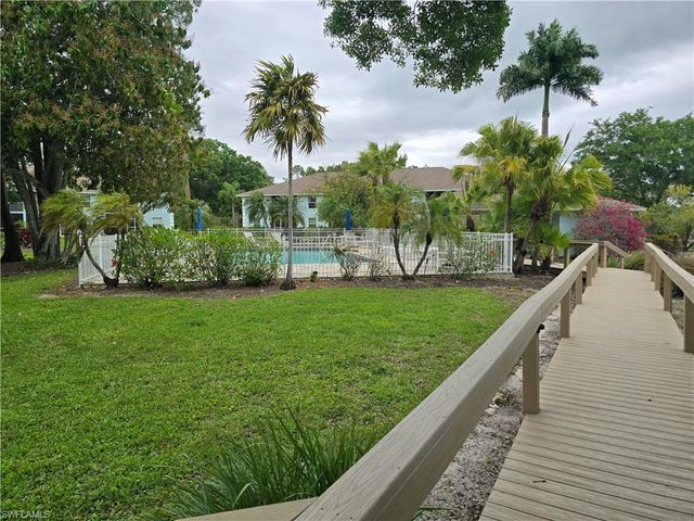 5741 Whitaker RD D-203, Naples, FL 34112