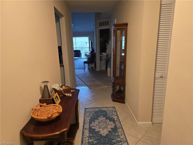 5741 Whitaker RD D-203, Naples, FL 34112