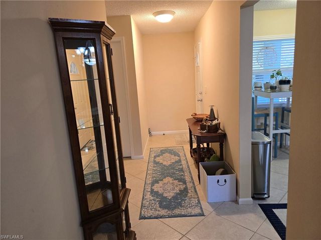 5741 Whitaker RD D-203, Naples, FL 34112