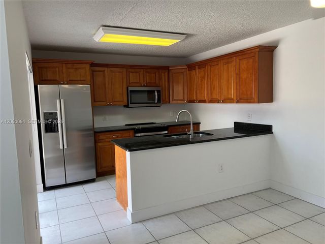9105 SW 19th Place A, Davie, FL 33324