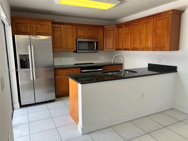 9105 SW 19th Place A, Davie, FL 33324