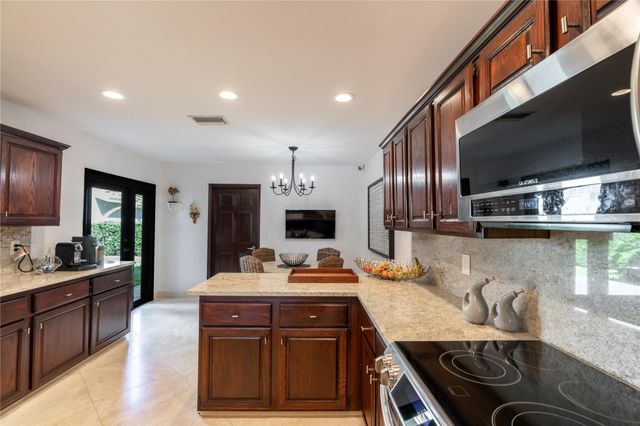 3182 Deer Creek Lake Shore Drive, Deerfield Beach, FL 33442