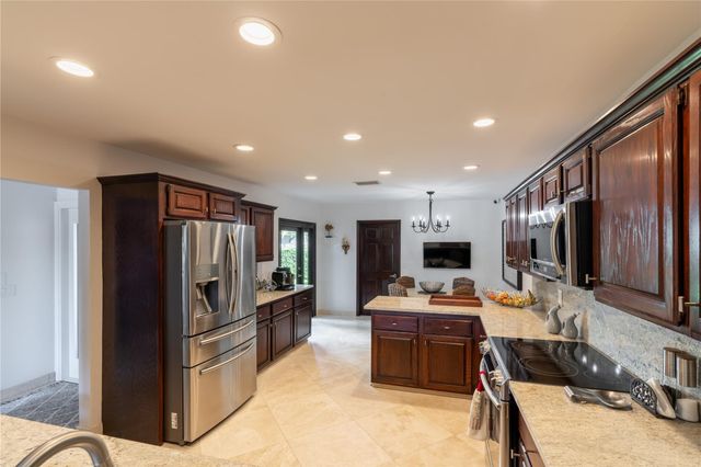 3182 Deer Creek Lake Shore Drive, Deerfield Beach, FL 33442