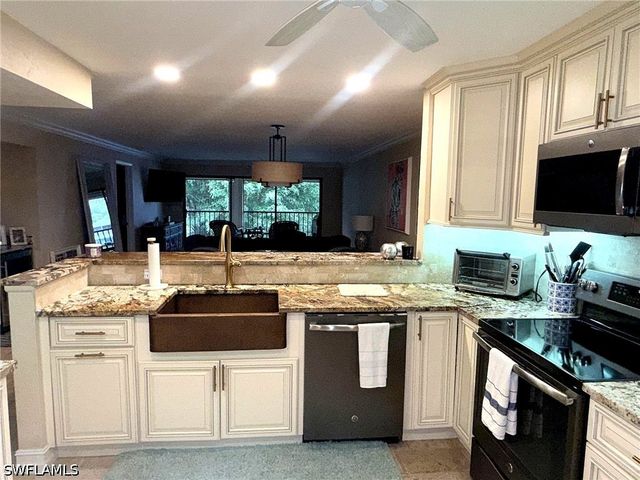 800 MISTY PINES CIR 202, Naples, FL 34105