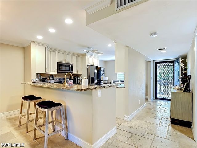 800 MISTY PINES CIR 202, Naples, FL 34105