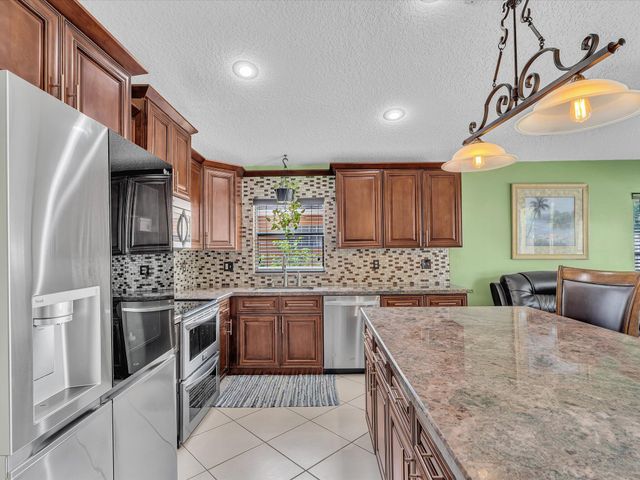 7559 Savannah Lane, Greenacres, FL 33463