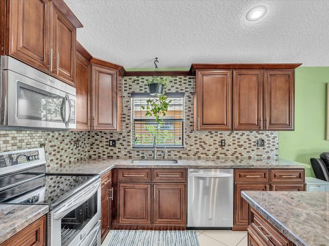 7559 Savannah Lane, Greenacres, FL 33463