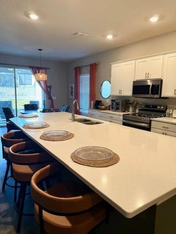 1348 MOUNTAIN FLOWER LANE, Davenport, FL 33837