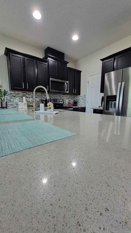 2629 PLAY HARD ALLEY, Kissimmee, FL 34744