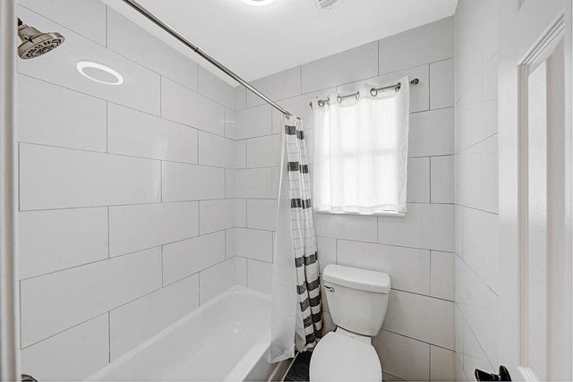 55 Dew Fall Court, The Woodlands, TX 77380