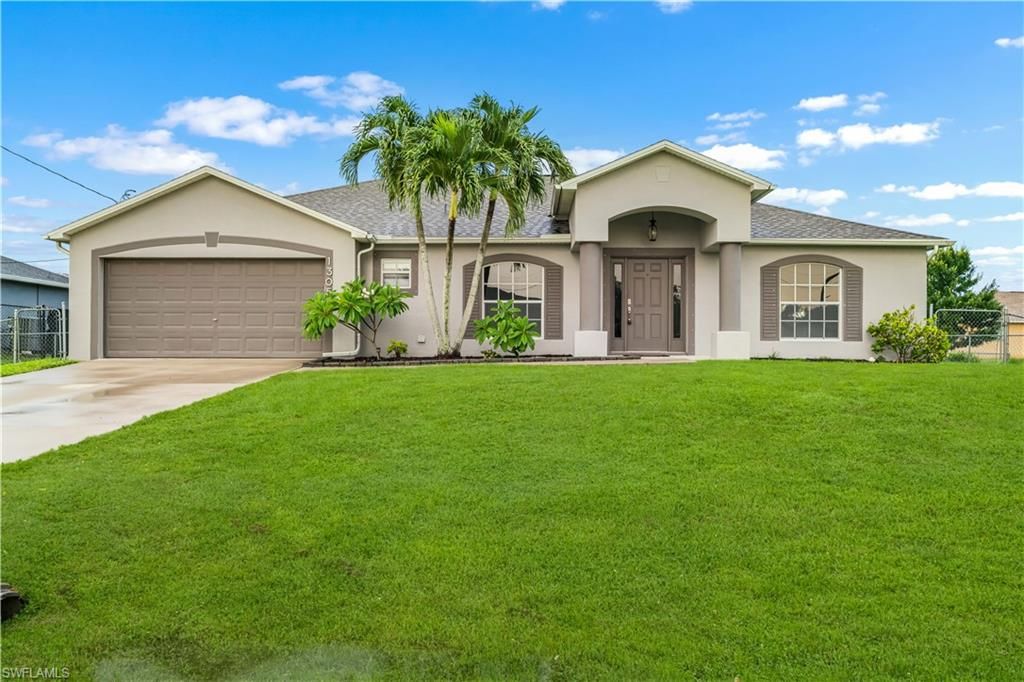 Image 1 of property listing at 1305 SW 22nd PL, Cape Coral, FL 33991