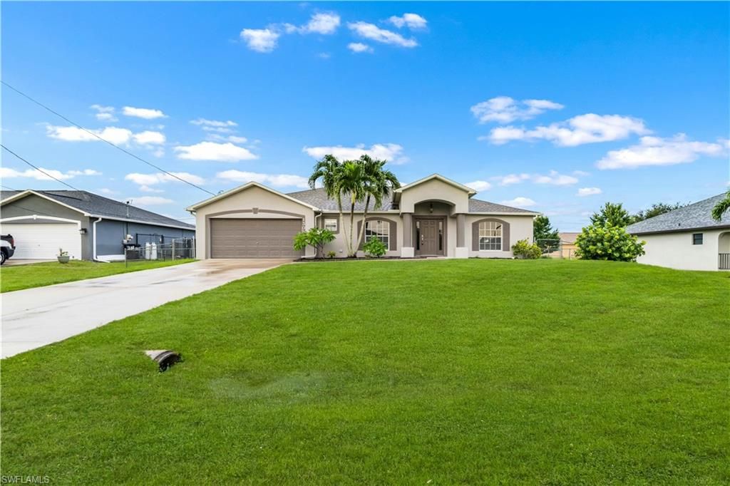 Image 2 of property listing at 1305 SW 22nd PL, Cape Coral, FL 33991