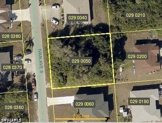 719 Ivan AVE S, Lehigh Acres, FL 33973