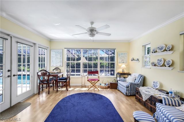 712 Pine Creek LN, Naples, FL 34108