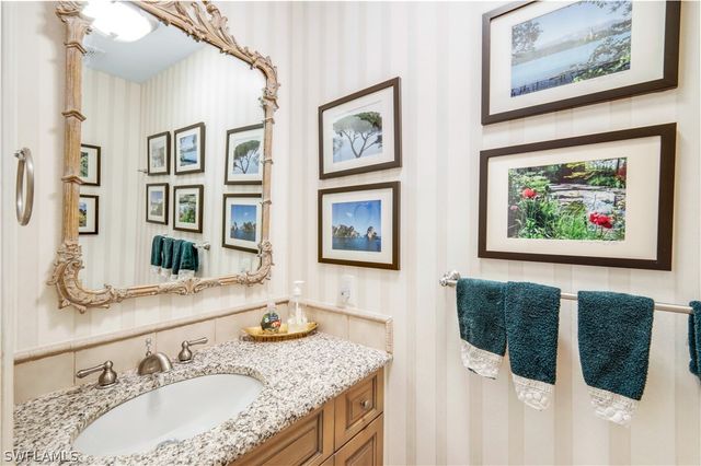 712 Pine Creek LN, Naples, FL 34108