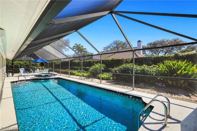 712 Pine Creek LN, Naples, FL 34108