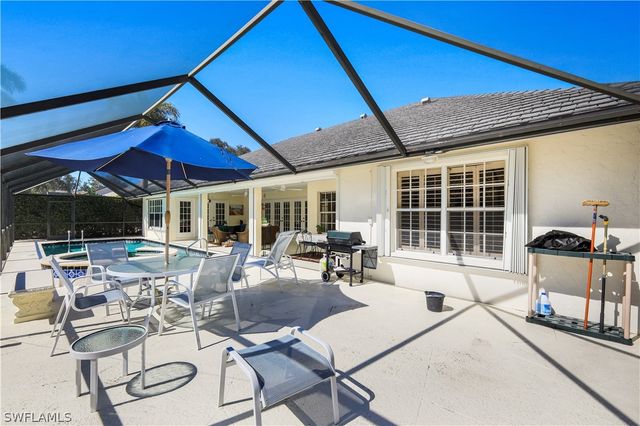 712 Pine Creek LN, Naples, FL 34108