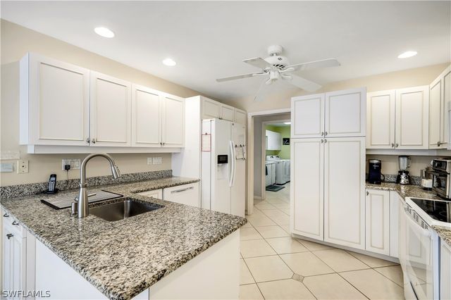 712 Pine Creek LN, Naples, FL 34108