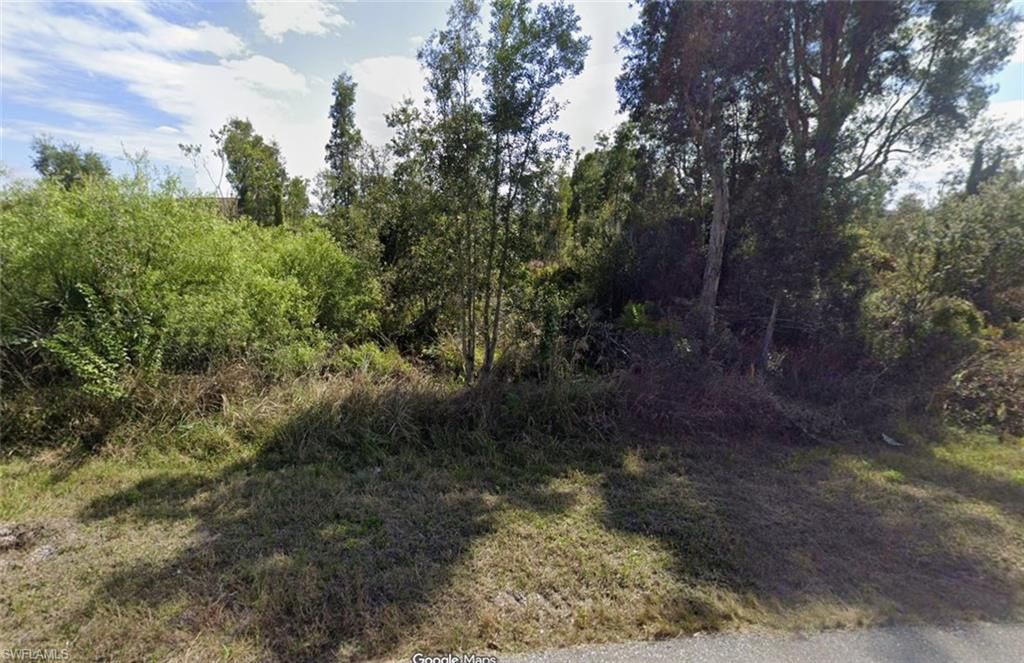 2703 36th ST SW, LEHIGH ACRES, FL 33976 — exterior
