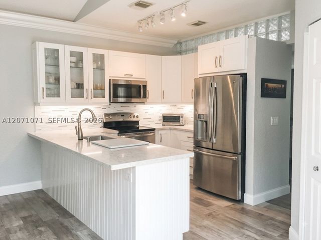 7548 NW 3rd Ct, Plantation, FL 33317