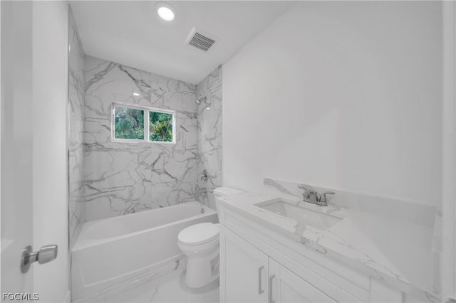 424 Alabama RD S, Lehigh Acres, FL 33936