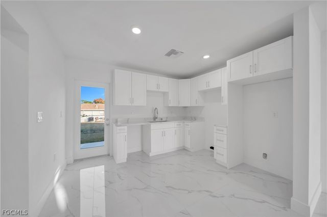 424 Alabama RD S, Lehigh Acres, FL 33936