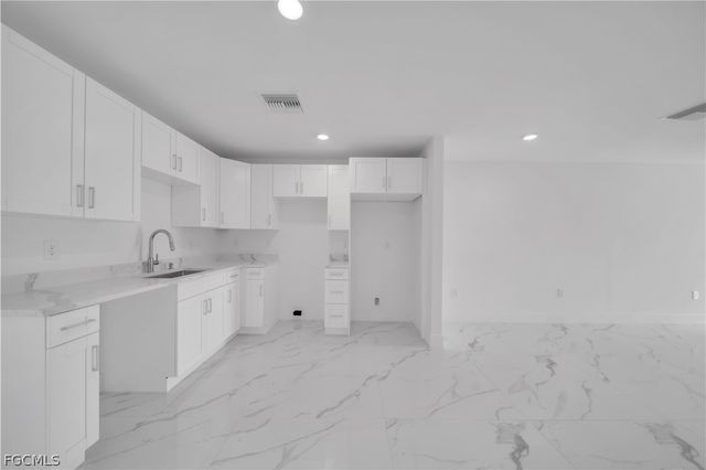 424 Alabama RD S, Lehigh Acres, FL 33936