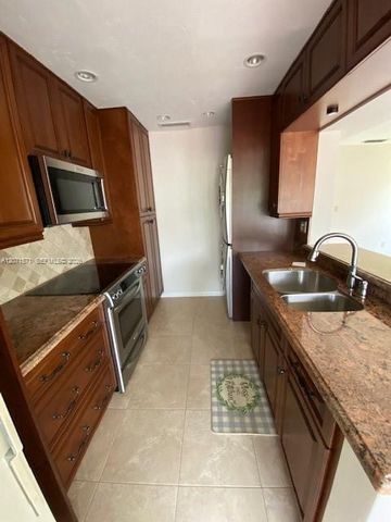 11942 SW 122nd Place ., Miami, FL 33186