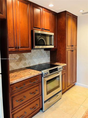 11942 SW 122nd Place ., Miami, FL 33186