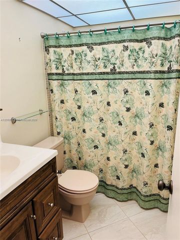 11942 SW 122nd Place ., Miami, FL 33186