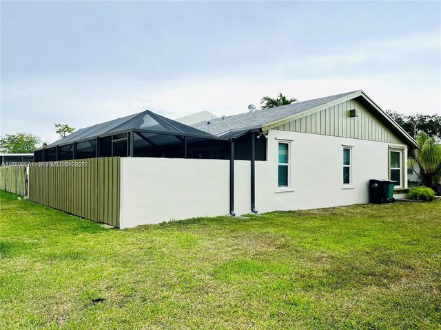 11942 SW 122nd Place ., Miami, FL 33186