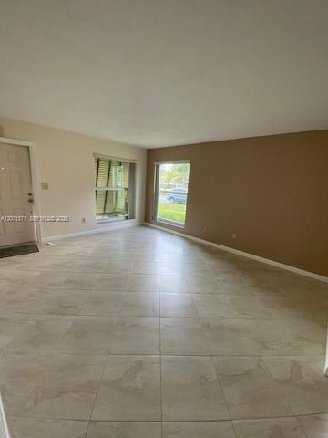 11942 SW 122nd Place ., Miami, FL 33186