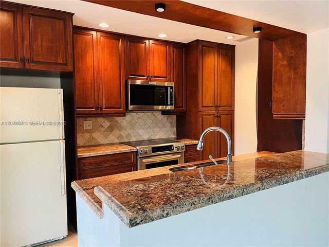 11942 SW 122nd Place ., Miami, FL 33186