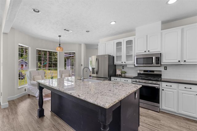 21818 Big River Drive, Magnolia, TX 77355