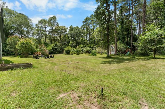 21818 Big River Drive, Magnolia, TX 77355