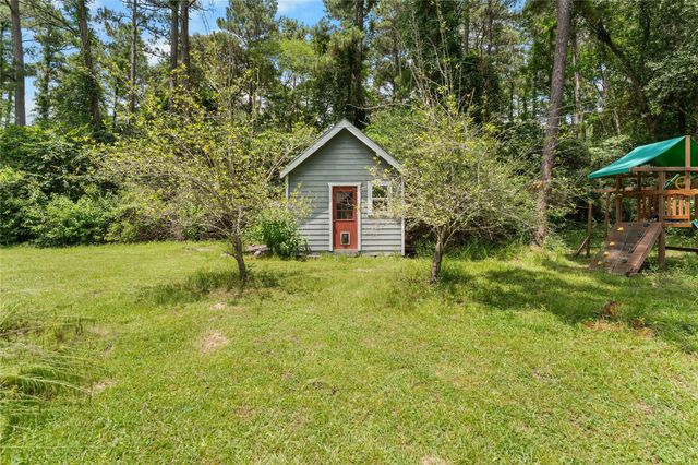21818 Big River Drive, Magnolia, TX 77355