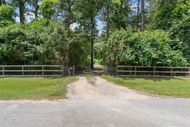 21818 Big River Drive, Magnolia, TX 77355